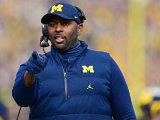 Sherrone Moore is elevated to head coach at Michigan.